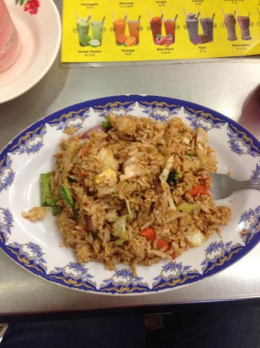 Nasi goreng (fried rice).  Are you learning some food words?  They're most of what I have picked up.  Nasi (rice), goreng (fried), and ayam (chicken) are words that will get you a long way!