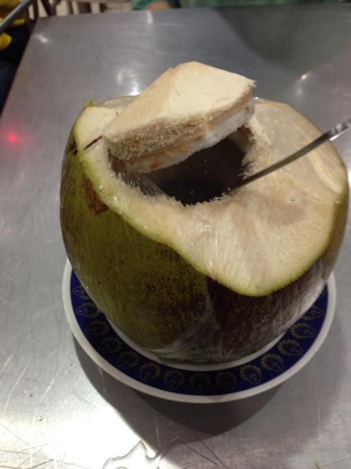 A coconut to drink, which tastes much better than boxed coconut water.