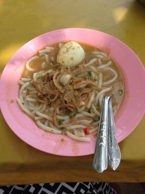 Laksa, with a hard-boiled egg at the top